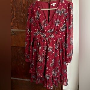 Very pretty maroon dress with beautiful details.